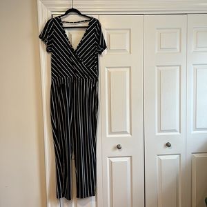 Trovare - deep v in the front and back jumpsuit.